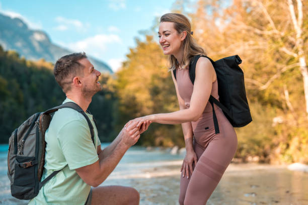 istock Caucasian Male Putting on Engagement Ring 1811517687