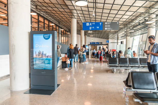 istock Diverse People Waiting For Boarding Gates To Open 1811519900