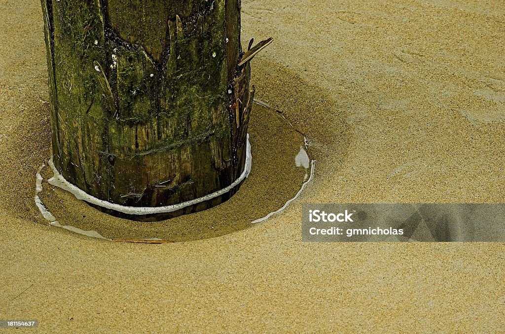 Playa piling - Foto de stock de Agua libre de derechos