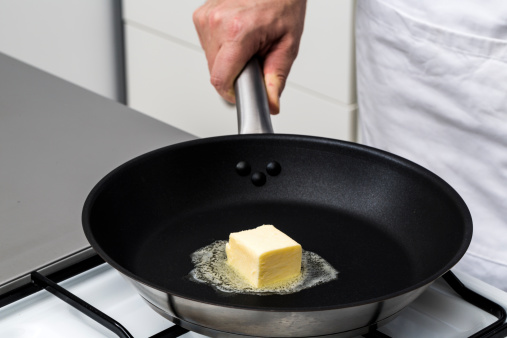 Pan with melting butter