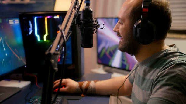 istock Pro gamer puts professional headphone and start playing 1811547260