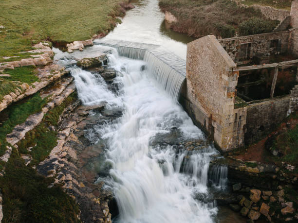 Allemans-du-Dropt, France  26 March 2022: Old mill on the Dropt river.