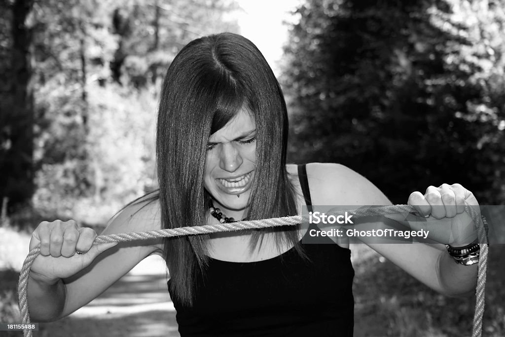 Breaking The Addiction Symbolic image of someone trying to brake an addiction. 16-17 Years Stock Photo