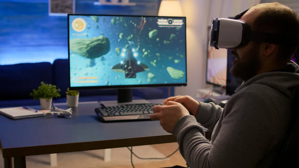 istock Competitive gamer winning space shooter video games championship 1811574375