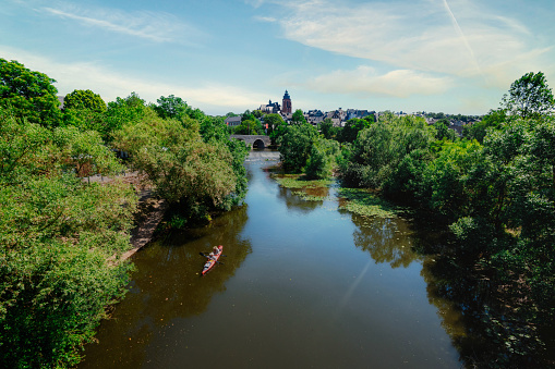 view on historic Wetzlar at Lahn river with weir in the foreground and church in the background