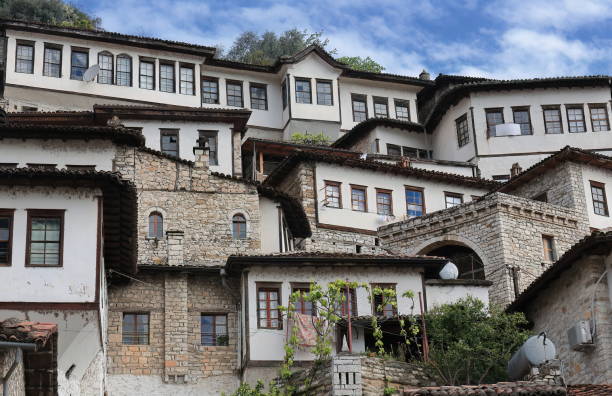 istock 'Thousand Windows' or 'Windows over Windows' houses in Mangalem district on the Osum river north bank. Berat-Albania-064 1811587521