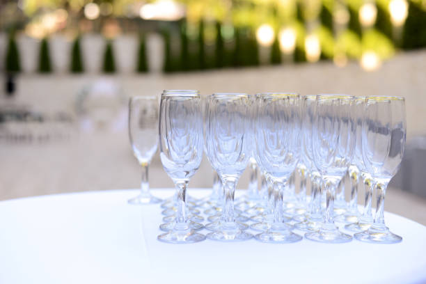 istock Wedding welcome drink table with glasses. Welcome Compliment for Guests. Selective focus. 1811588129
