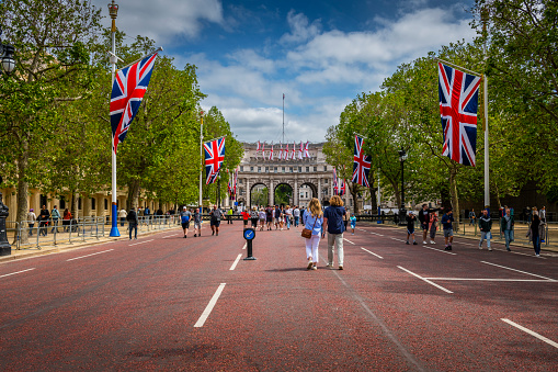 London, United Kingdom - May 29, 2023: Many people walking along The Mall Street to  the  Admiralty Arch.