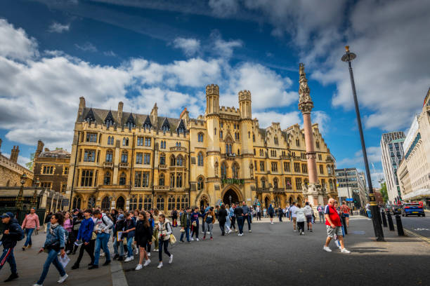 London, United Kingdom - May 29, 2023: Many people walking in front of the Attorney General's Office historical building London
