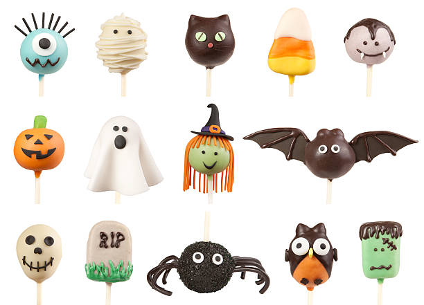 Halloween cake pops Variety of Halloween cake pops isolated on white background jack o lantern photos stock pictures, royalty-free photos & images