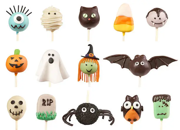Variety of Halloween cake pops isolated on white background