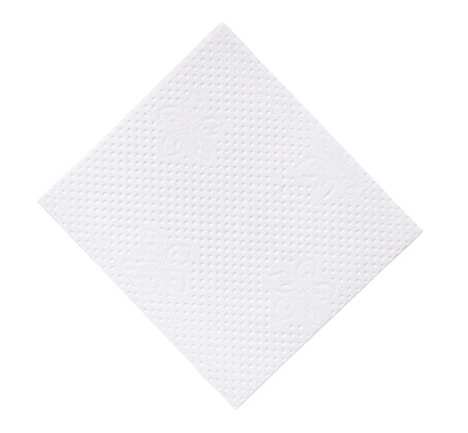 Top view of folded white tissue paper or napkin is isolated on white background with clipping path
