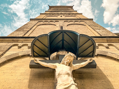 The San Francisco de Assisi (Saint Francis of Assisi) Catholic Mission Church in Ranchos De Taos, New Mexico is a Spanish colonial church completed in 1816.  This image was taken the Monday after Easter, so the cross is still draped in white. 