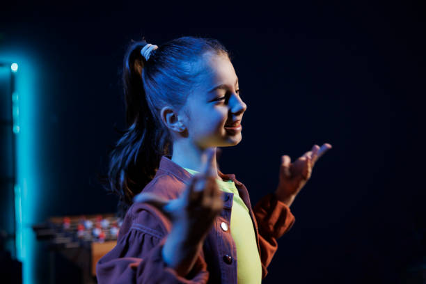 istock Small girl in her apartment does latest internet dancing challenge 1811686239