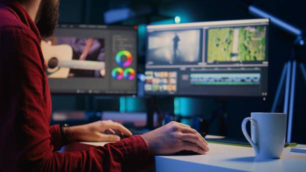 istock Video editor arranging recorded stock clips into seamless whole in creative multimedia agency 1811697321