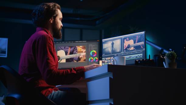 istock Post production studio employee starts shift in creative office, working with raw footage 1811703886