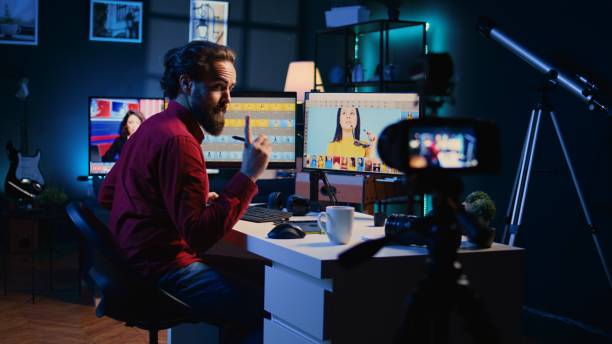 istock Photo editor filming online tutorial about professionally color correcting photographs 1811704966