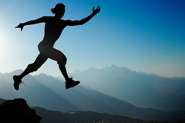 istock man running in the mountains. 181172246