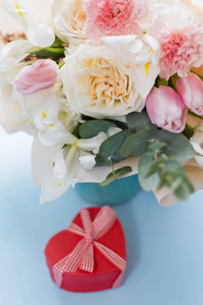istock Beautiful bouquet and heart gift box 1811733199