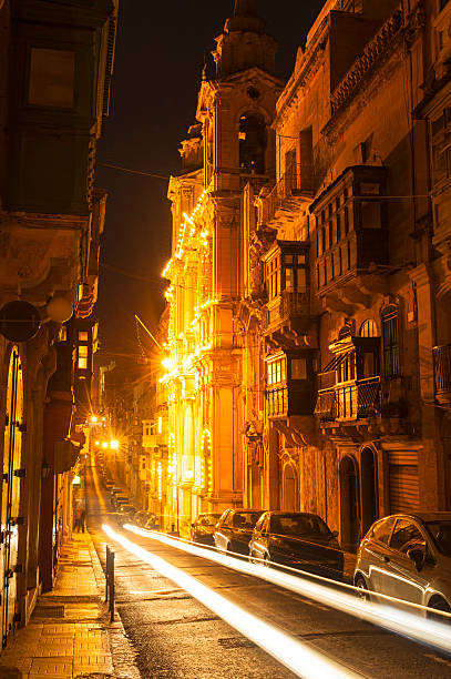 istock Street in Valletta Malta at night 181175034
