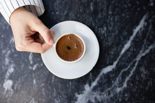 Woman Holding Turkish Coffee stock photo