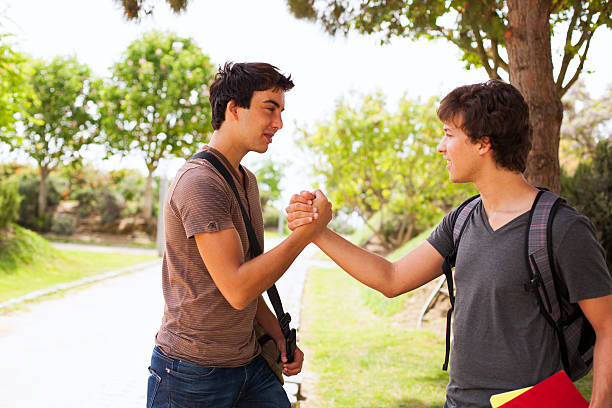 Student handshake stock photo