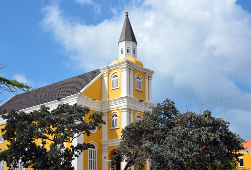 Willemstad, Curaçao, Kingdom of the Netherlands: Temple Emanuel (Emanu-El) on Hendrikplein / Wilhelminaplein in Punda dates back to 1864, when a group of Reform Jews broke away from the older Orthodox Mikve Israel congregation (both Sephardic), the temple was completed in 1867.  The prayer house was called \