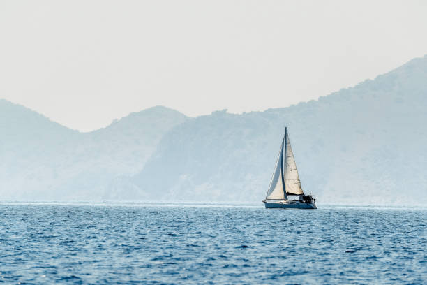istock Beautiful seascape with white sailboat 1811870576