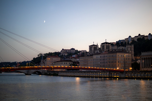 The view of Passerelle du Palais-de-Justice and the Saône River in Lyon, France.