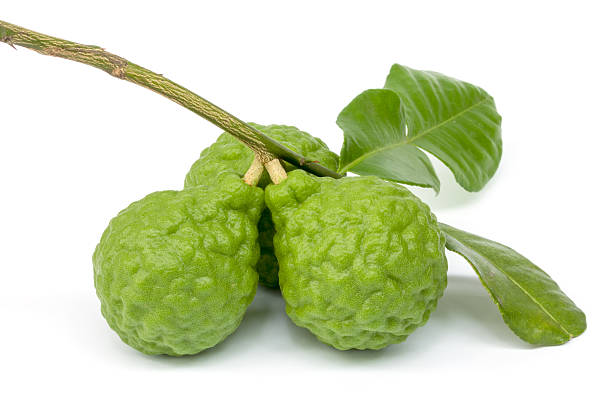 istock Kaffir Lime with leaves isolated on white background 181187265