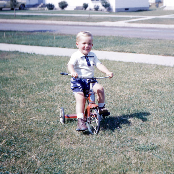 istock little boy on new tricycle 1811913698