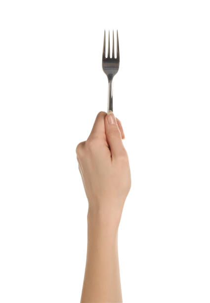 istock Woman holding clean fork on white background, closeup 1812001564