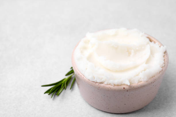 istock Delicious pork lard in bowl on light table, space for text 1812010707