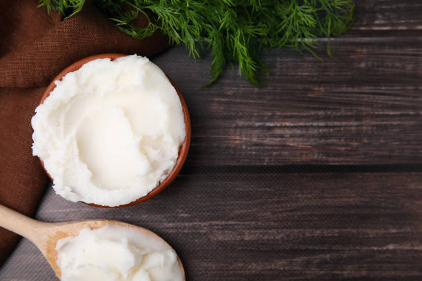 istock Delicious pork lard and dill on wooden table, flat lay. Space for text 1812011790