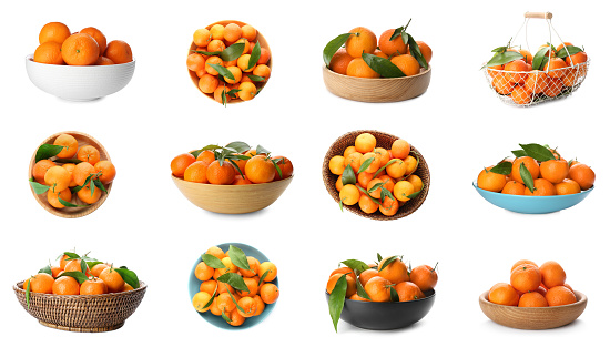 Set with fresh ripe tangerines on white background