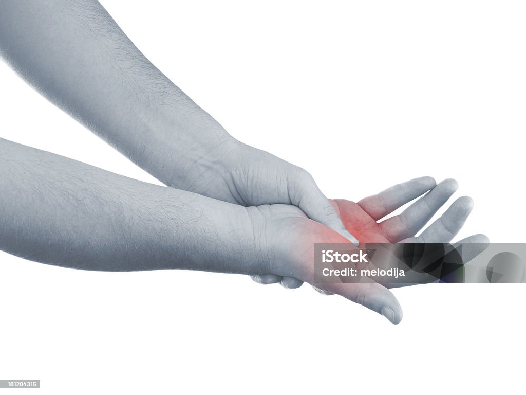 Pain in a man palm Pain in a man palm. Male holding hand to spot of palm-ache. Adult Stock Photo