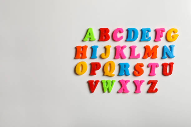 istock Colorful magnetic letters on white background, flat lay. Alphabetical order 1812053496