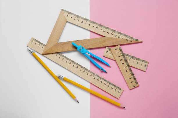 istock Flat lay composition with different rulers and compass on color background 1812060522