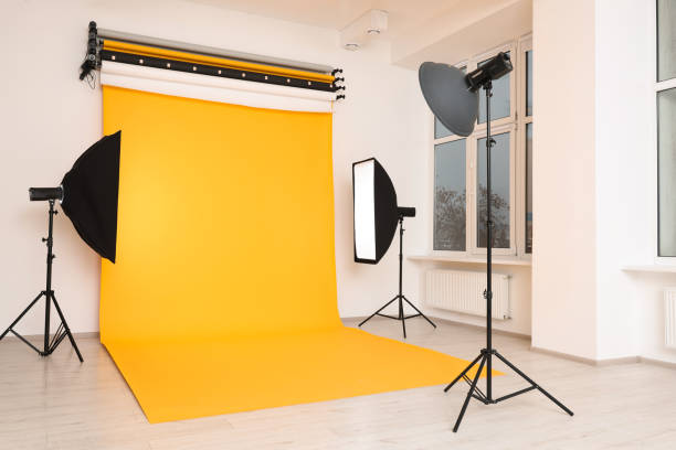 istock Interior of modern photo studio with professional lighting equipment 1812072845