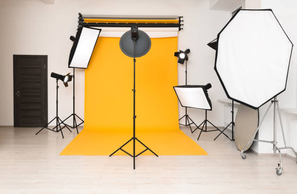 istock Interior of modern photo studio with professional lighting equipment 1812072847