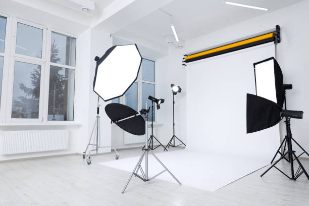istock Interior of modern photo studio with professional lighting equipment 1812072853