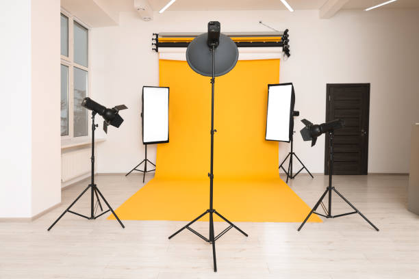 istock Interior of modern photo studio with professional lighting equipment 1812073366