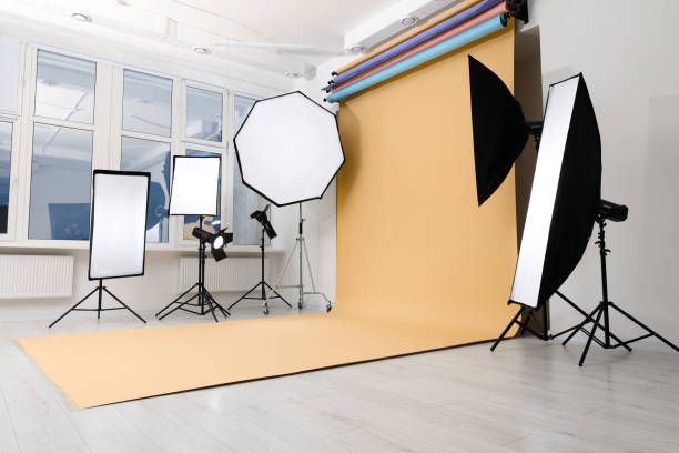 istock Interior of modern photo studio with professional lighting equipment 1812073367