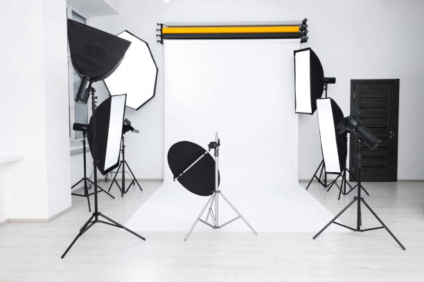 istock Interior of modern photo studio with professional lighting equipment 1812073373