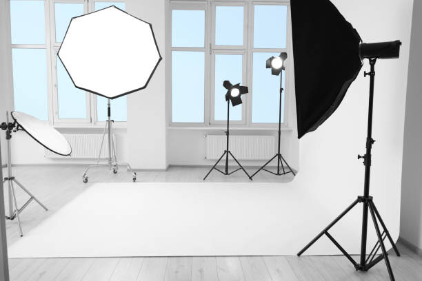 istock Interior of modern photo studio with professional lighting equipment 1812073380