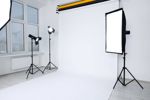 istock Interior of modern photo studio with professional lighting equipment 1812073381