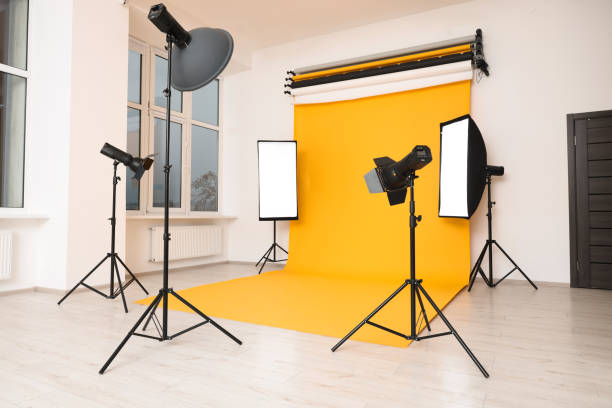 istock Interior of modern photo studio with professional lighting equipment 1812073383