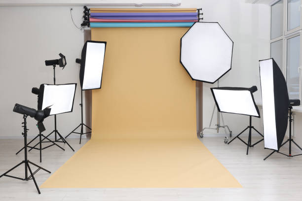istock Interior of modern photo studio with professional lighting equipment 1812075043
