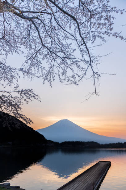 istock Sunrise Mt. Fuji reflected on the surface of Lake Tanuki Timelapse 1812158639
