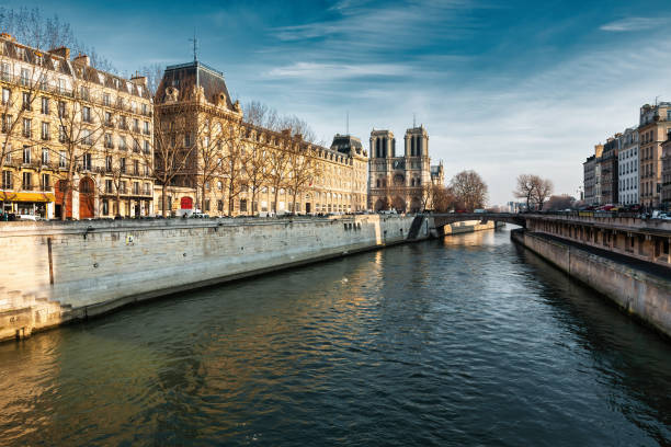 Seine waterfront in downtown Paris, France with Notre Dame de Paris in the background.